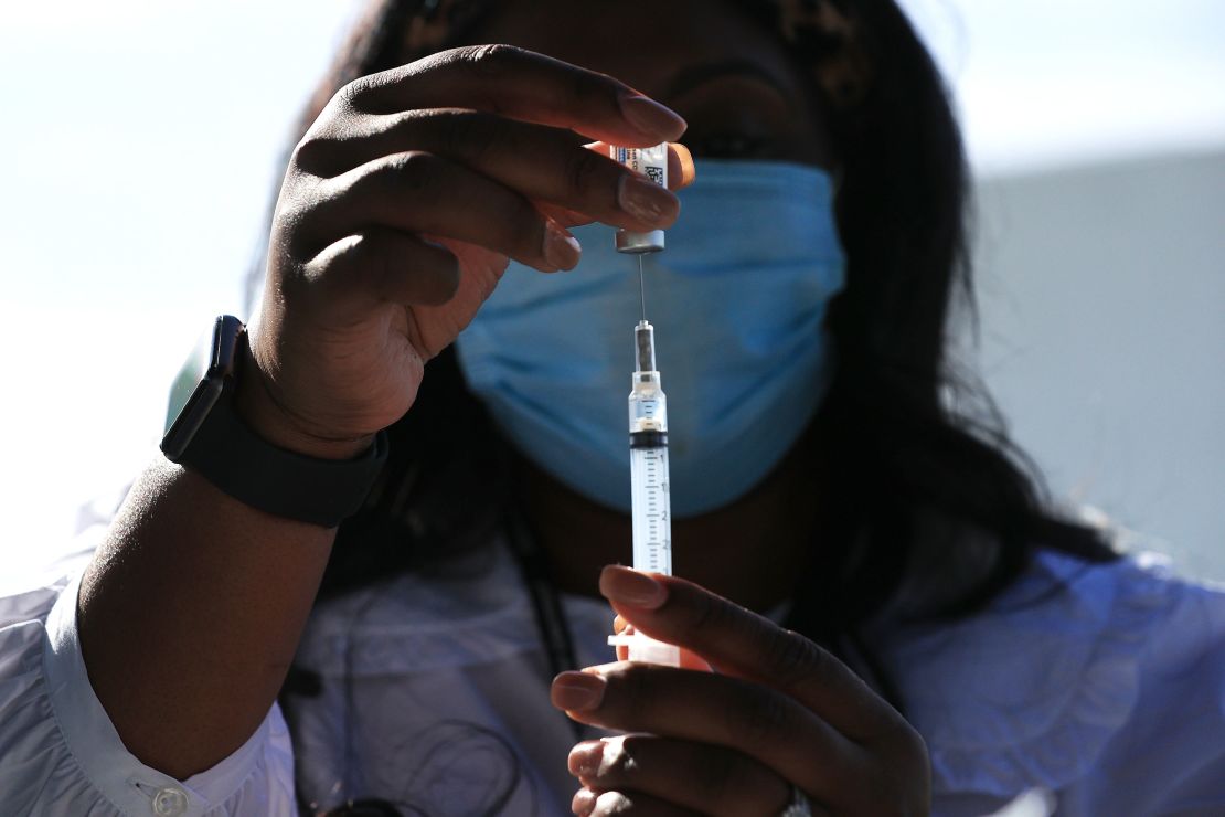 A DC Health nurse manager fills a syringe with a dose of the J&J Covid-19 vaccine in Washington, DC, on May 6, 2021.