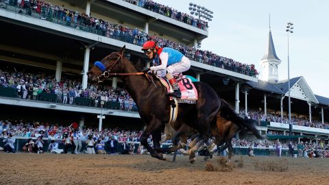 Medina Spirit crosses the finish line to win the 147th running of the Kentucky Derby.