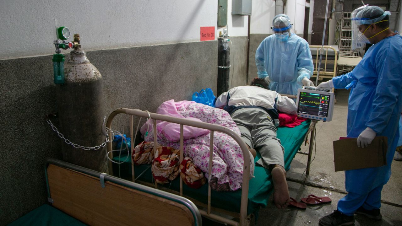 Nepali doctors treat a Covid-19 patient on the corridor of the emergency ward of a hospital in Kathmandu, Nepal on May 5.