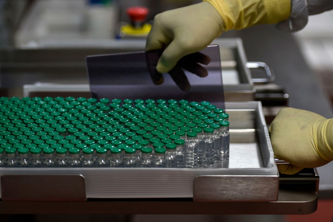 Vials of Covishield, AstraZeneca-Oxford's Covid-19 coronavirus vaccine are pictured inside a lab where they are being manufactured at India's Serum Institute in Pune on January 22, 2021.