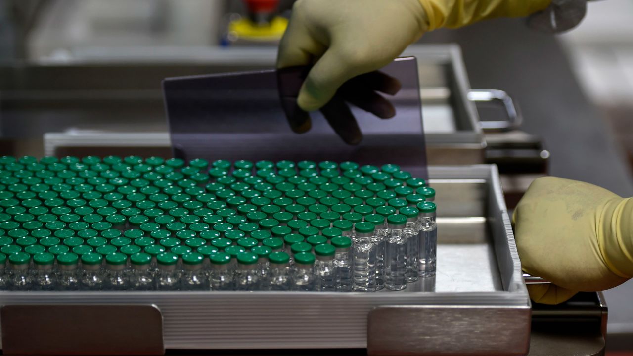 Vials of Covishield, AstraZeneca-Oxford's Covid-19 coronavirus vaccine are pictured inside a lab where they are being manufactured at India's Serum Institute in Pune on January 22, 2021.