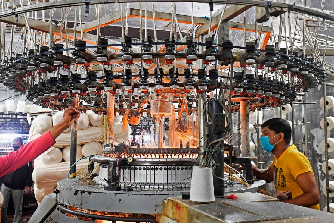 Labourers work in a Hosiery mill in Kolkata on February 1, 2021.
