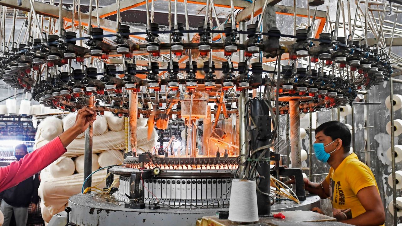 Labourers work in a Hosiery mill in Kolkata on February 1, 2021.