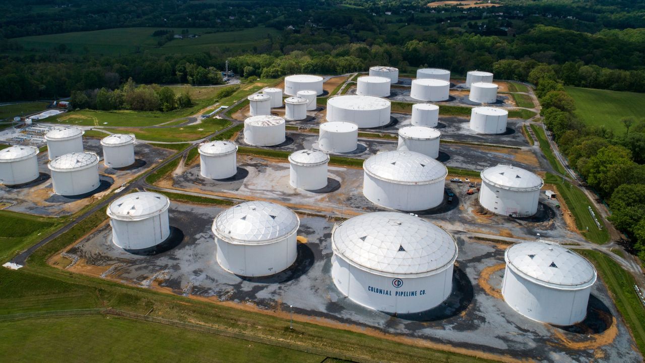 Mandatory Credit: Photo by JIM LO SCALZO/EPA-EFE/Shutterstock (11895253o)
An image made with a drone shows fuel tanks at a Colonial Pipeline breakout station in Woodbine, Maryland, USA, 08 May 2021. A cyberattack forced the shutdown of 5,500 miles of Colonial Pipeline's sprawling interstate system, which carries gasoline and jet fuel from Texas to New York.
Cyberattack forces shutdown of Colonial Pipeline in US, Woodbine, USA - 08 May 2021