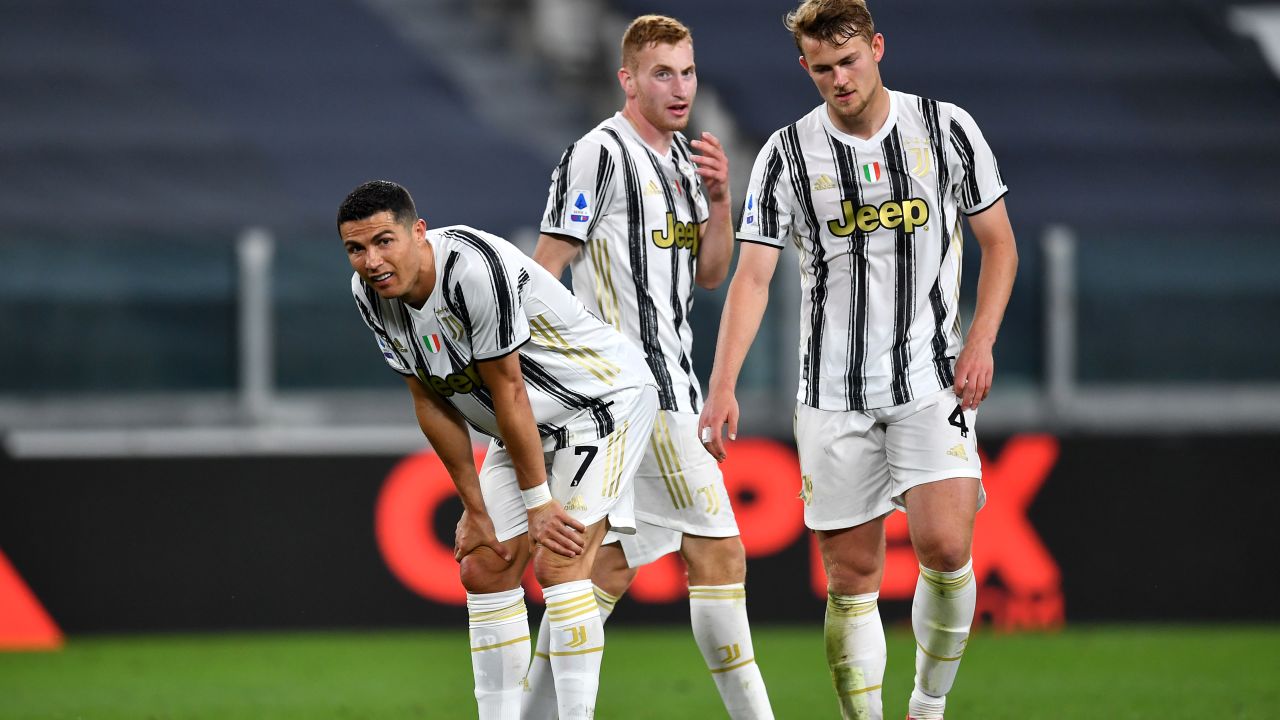Juventus players look dejected during their defeat to AC Milan.