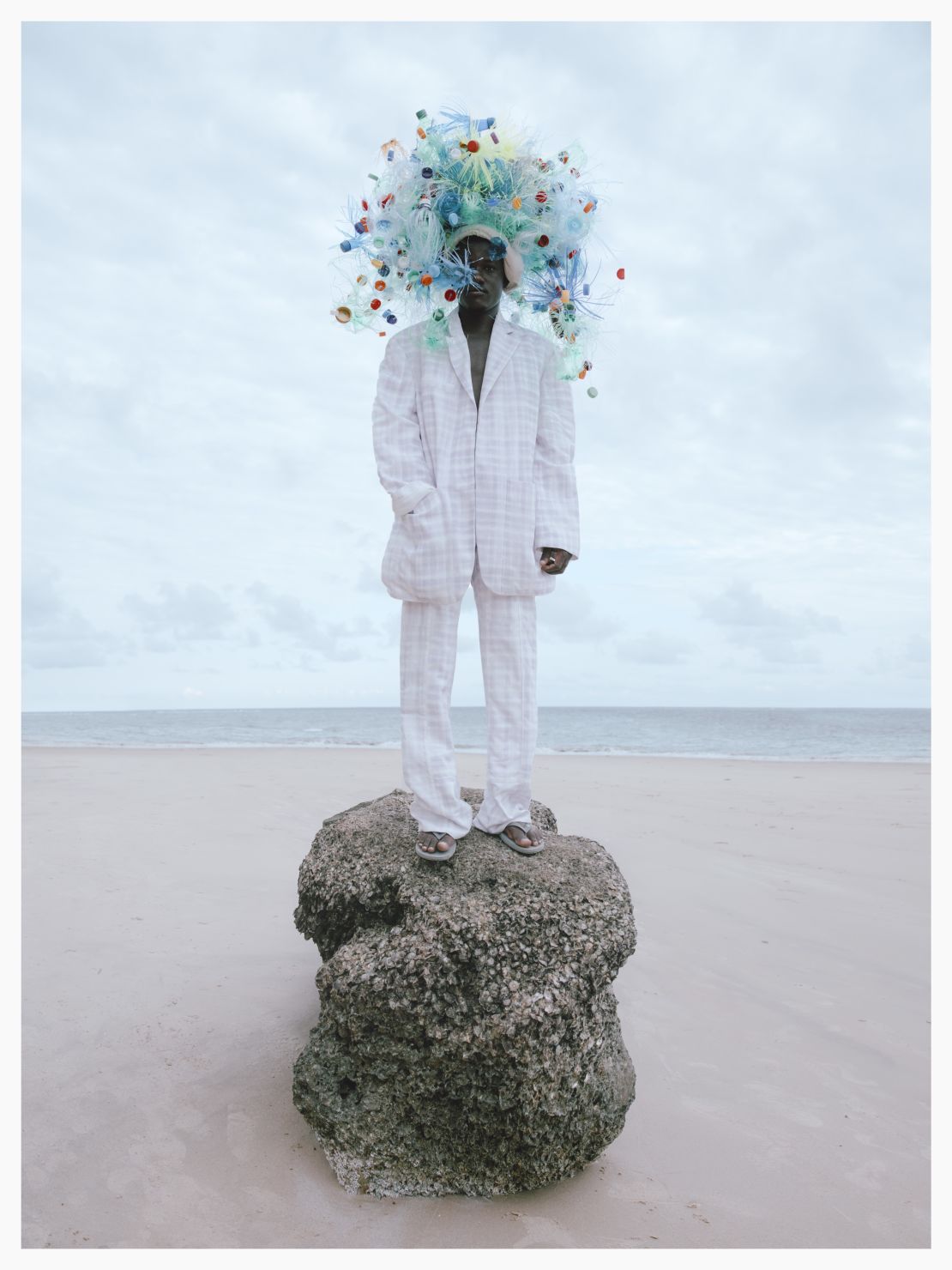 In 2020, Moolman took part in a virtual photography show, "28 Hats for Lamu." The photos, featuring eccentric headpieces, celebrate the transformative power of creativity. 