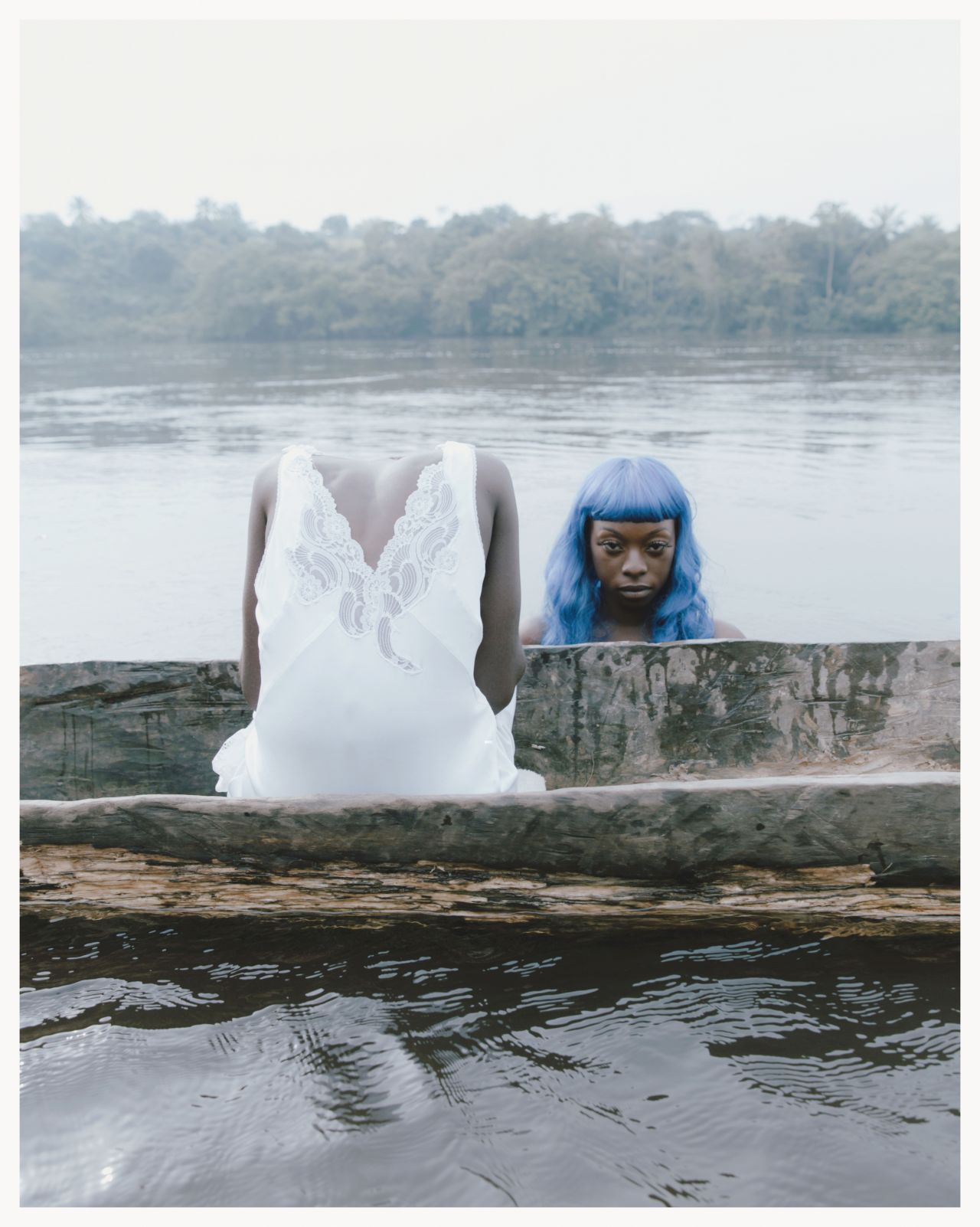 This is a still from the shoot for "Peau de Chagrin/Bleu de Nuit," a music video filmed with Belgian-Congolese rapper Baloji.