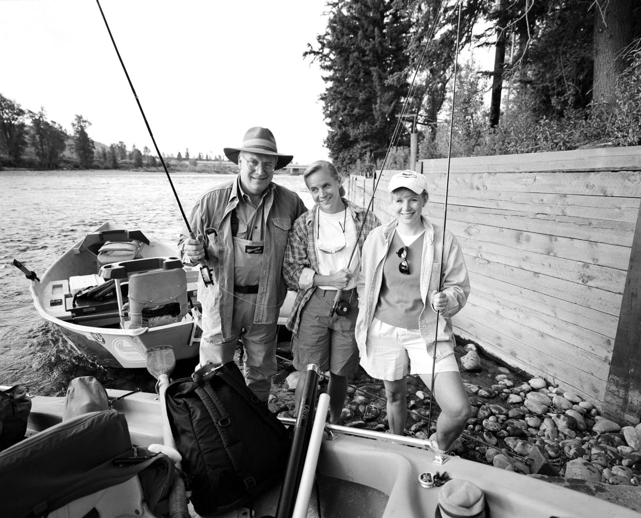 Dick Cheney fishes with Mary, center, and Liz in August 2000.