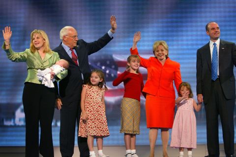 Cheney, left, joins her parents, her husband and her children on stage after her dad spoke at the Republican National Convention in September 2004.