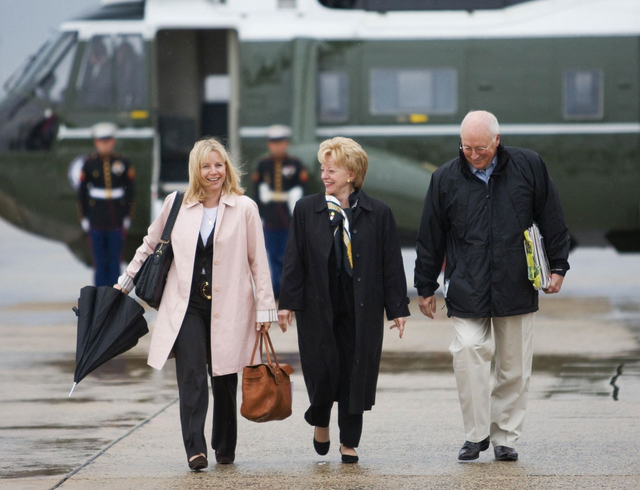 Cheney walks with her parents to Air Force Two as they prepare to leave for a 10-day trip to the Middle East in 2008.