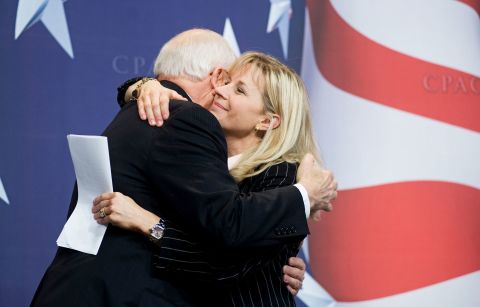 Cheney hugs her father at the Conservative Political Action Conference in 2010.