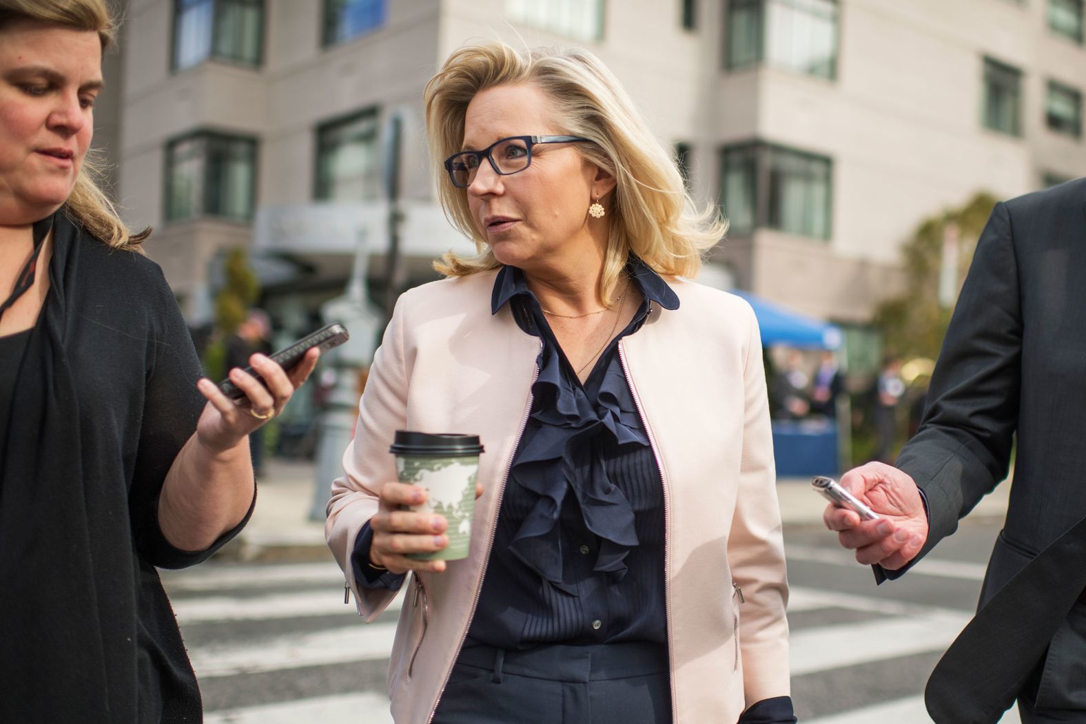 Cheney talks with members of the media as she and other freshman members of Congress checked in for orientation in November 2016.