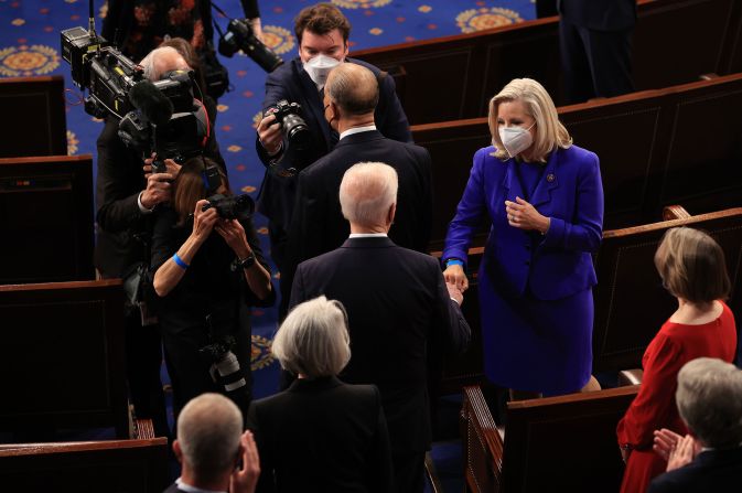 President Joe Biden fist-bumps Cheney as he arrives to speak to a <a href="index.php?page=&url=http%3A%2F%2Fwww.cnn.com%2F2021%2F04%2F28%2Fpolitics%2Fgallery%2Fbiden-first-address-joint-session-congress%2Findex.html" target="_blank">joint session of Congress</a> in April 2021.