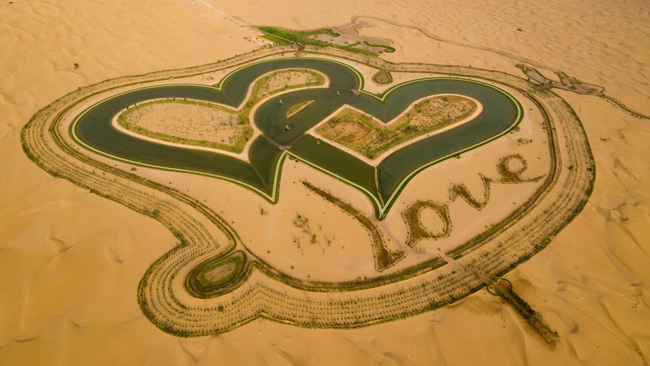 |A drone image from 2019 shows the new man-made "Love Lake" in the al-Qudra desert. 