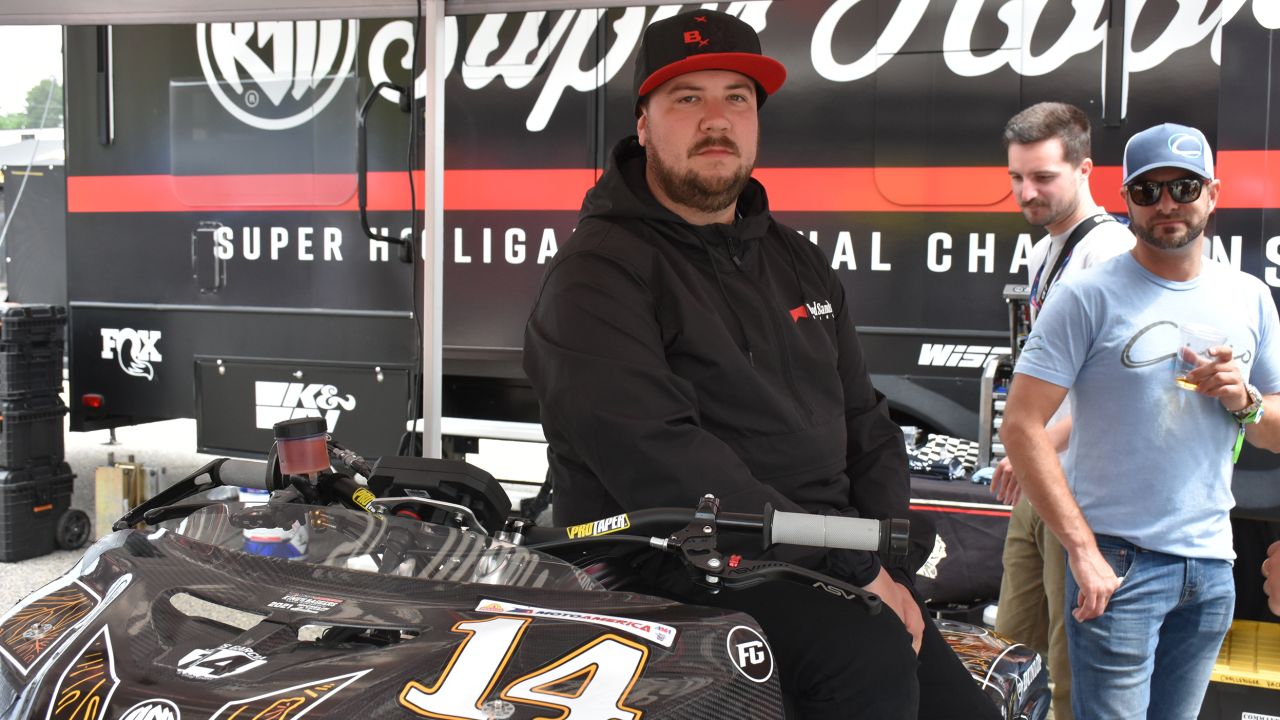 Rider Frankie Garcia poses on his bike ahead of a race.