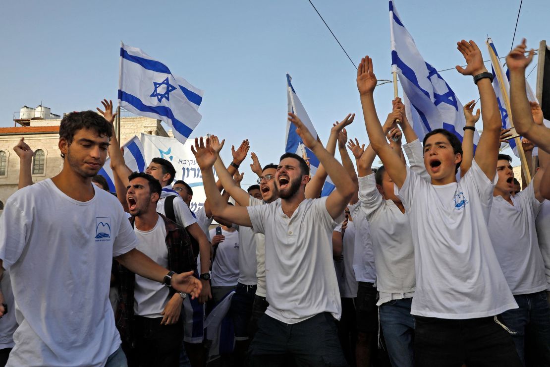 Israelis take part in a Jerusalem Day march on May 10. This was diverted at the last minute by police.