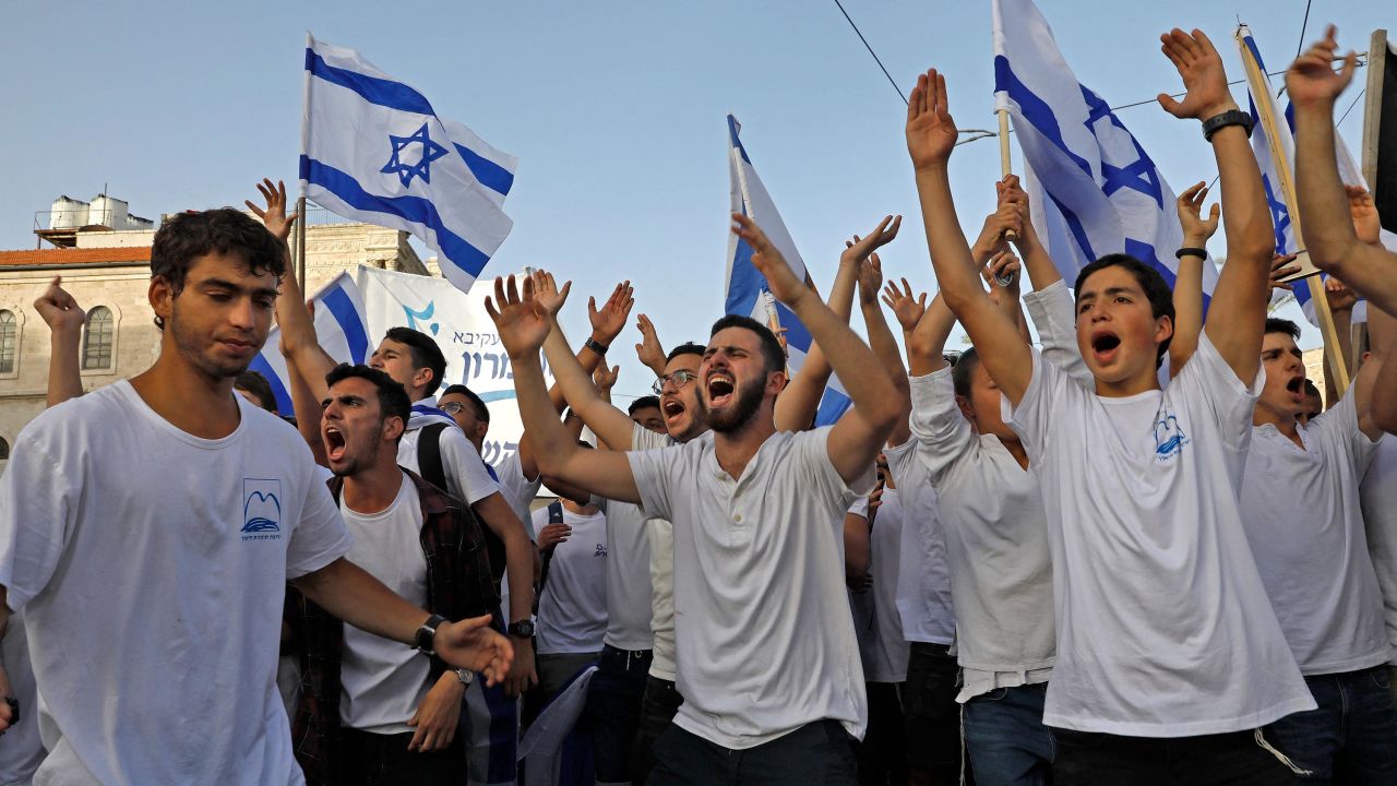 Israelis take part in a Jerusalem Day march on May 10. This was diverted at the last minute by police.