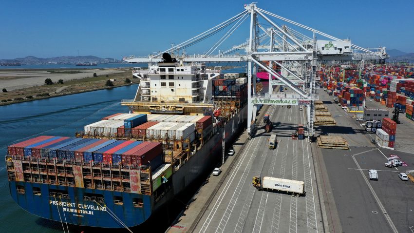 OAKLAND, CALIFORNIA - MAY 07: In an aerial view, an container ship is unloaded at the Port of Oakland on May 07, 2021 in Oakland, California. The Port of Oakland reported a record high in cargo traffic volume between January and March of this year with 631,119 20-foot shipping containers compared to 612,151 set in the first quarter of 2019. (Photo by Justin Sullivan/Getty Images)