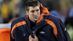 FOXBORO, MA - JANUARY 14:  Tim Tebow #15 of the Denver Broncos looks on against the New England Patriots during their AFC Divisional Playoff Game at Gillette Stadium on January 14, 2012 in Foxboro, Massachusetts.  (Photo by Jim Rogash/Getty Images)