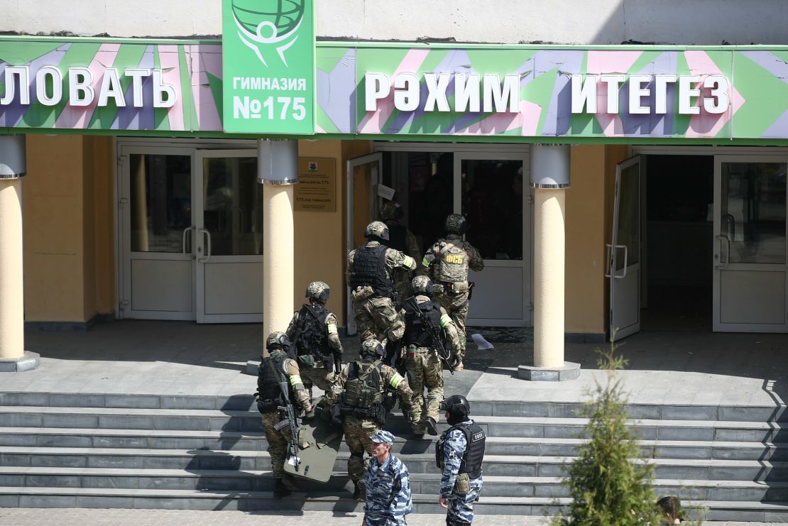 Federal Security Services officers are seen at the school in Kazan, Russia.