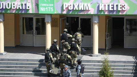 Federal Security Services officers are seen at the school in Kazan, Russia.