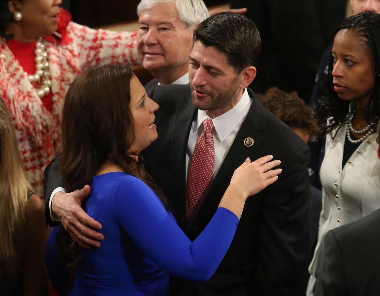 Stefanik gets a hug from US Rep. Paul Ryan before the start of the first session of Congress in January 2015. Stefanik helped Ryan prepare for his vice presidential debate in 2012.