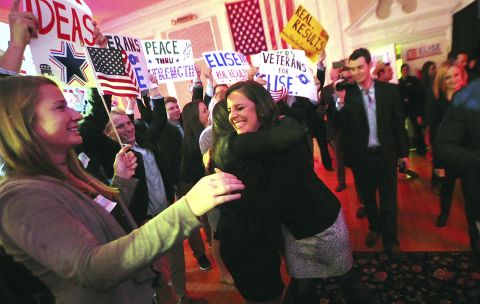 Stefanik hugs a supporter as she celebrates winning reelection in November 2016.