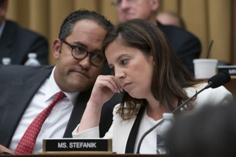Stefanik talks with US Rep. Will Hurd in July 2019 as former special counsel Robert Mueller testified to the House Intelligence Committee about his investigation into Russian interference in the 2016 election.