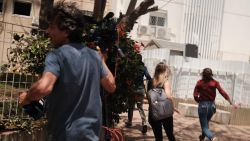 CNN's Hadas Gold, her team and residents rush to cover as warning sirens were heard in Ashkelon, Israel amid rising tensions between Israelis and Palestinians. Israel and Gaza militants have been exchanging fire after clashes in Jerusalem and an uptick in violence.