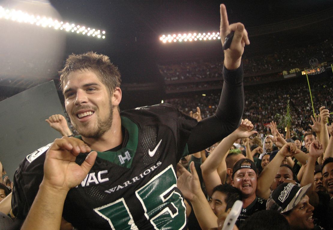 Colt Brennan on Nov. 23, 2007, celebrating after an NCAA college football game in Honolulu. 