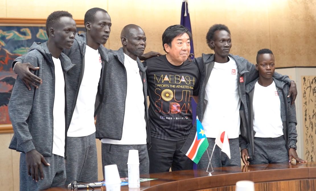 The mayor of Maebashi posing with the South Sudan Olympic team.