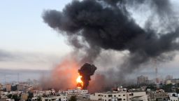 Smoke and flames rise during Israeli air strikes amid a flare-up of Israeli-Palestinian violence, in Gaza May 12, 2021. REUTERS/Ibraheem Abu Mustafa