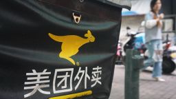 Photo taken on April 26, 2021 shows a Meituan food delivery sign on a street in Hangzhou, east China's Zhejiang Province.