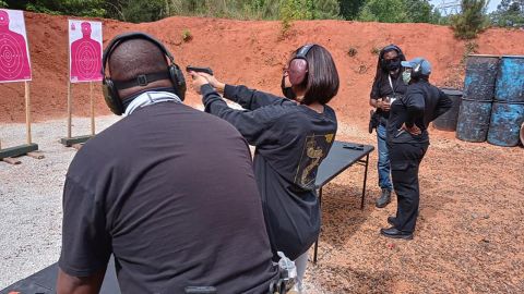 Members of the National African American Gun Association work on their aim at a shooting range in this undated photo.