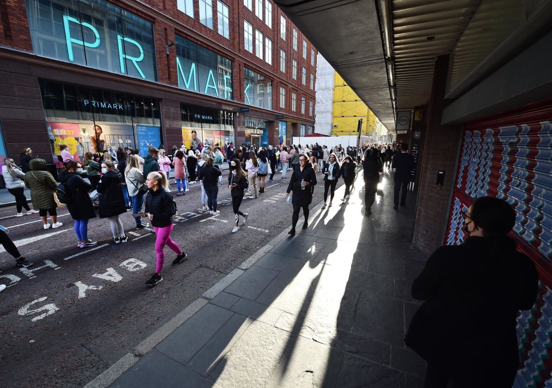 Thousands of shoppers wait for Primark to open for the first time since the latest lockdown on April 30, 2021 in Belfast, Northern Ireland. 
