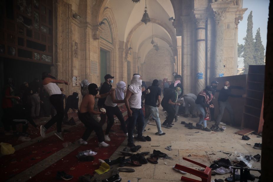 Palestinians are seen at the Aqsa Mosque compound during confrontations with Israeli police on May 10. 