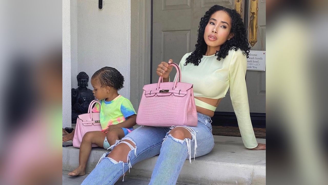 Entrepreneur Kay Cola, (pictured here with her young daughter) started her Birkin handbag collection in 2020.