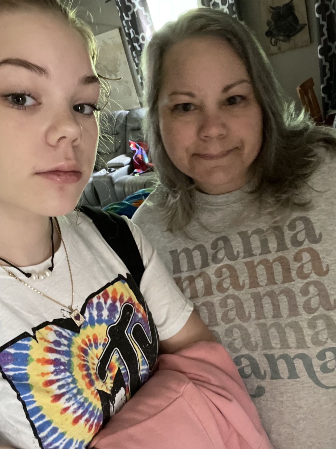 Cynthia Licharowicz is pleased that her daughter Sydney gets to make her own choice about masks.