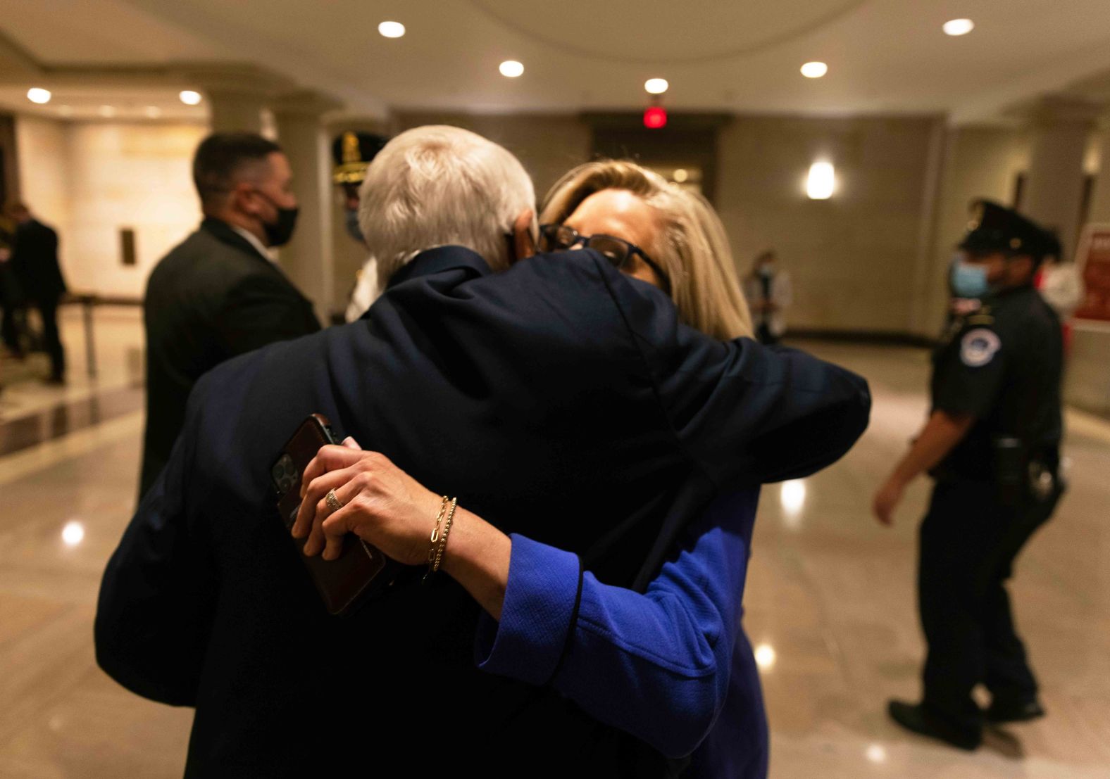 Cheney gets a hug from US Rep. John Carter, a Republican from Texas, after Wednesday's vote.