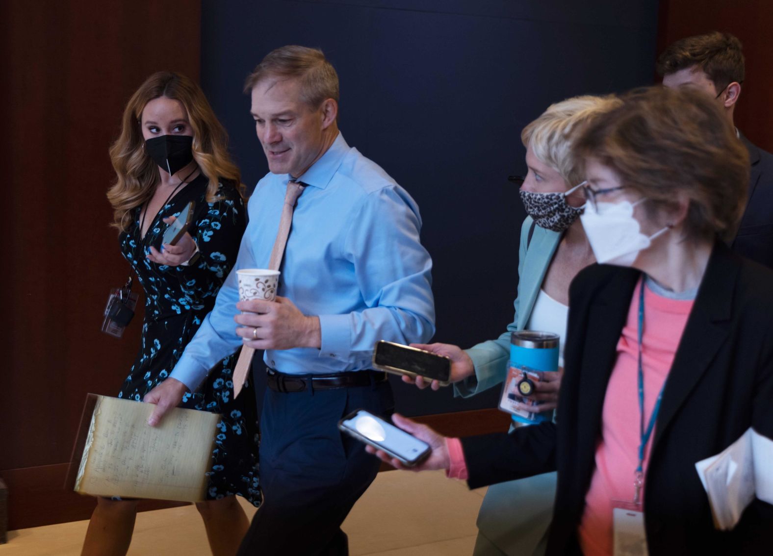 Reporters talk to US Rep. Jim Jordan, a fierce defender of former President Donald Trump, before House Republicans voted out Cheney as chairwoman of the House Republican Conference.