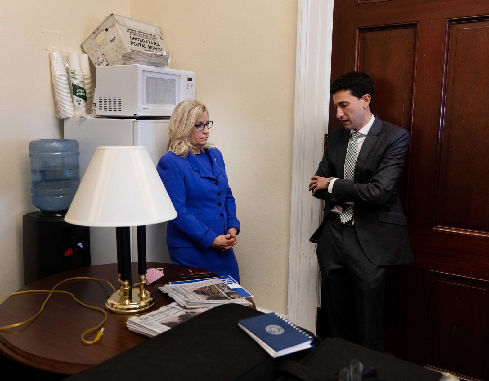 Cheney meets with her communications director after returning to her office on Wednesday. "It was not a cause for celebration, certainly. But she wasn't like distraught or anything," Kennerly said. "She was pretty businesslike. She knew what was going to happen and accepted the outcome."