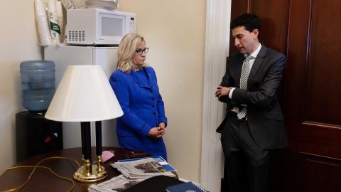 Cheney meets with her communications director after returning to her office on Wednesday. "It was not a cause for celebration, certainly. But she wasn't like distraught or anything," Kennerly said. "She was pretty businesslike. She knew what was going to happen and accepted the outcome."