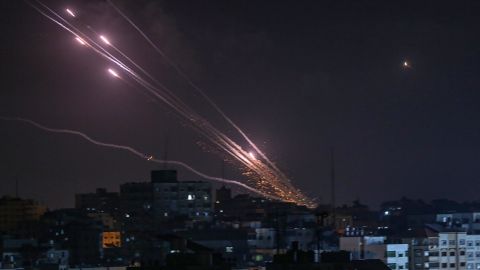 Rockets fired from Gaza fly towards Israel, as seen from Gaza City, on Wednesday. 