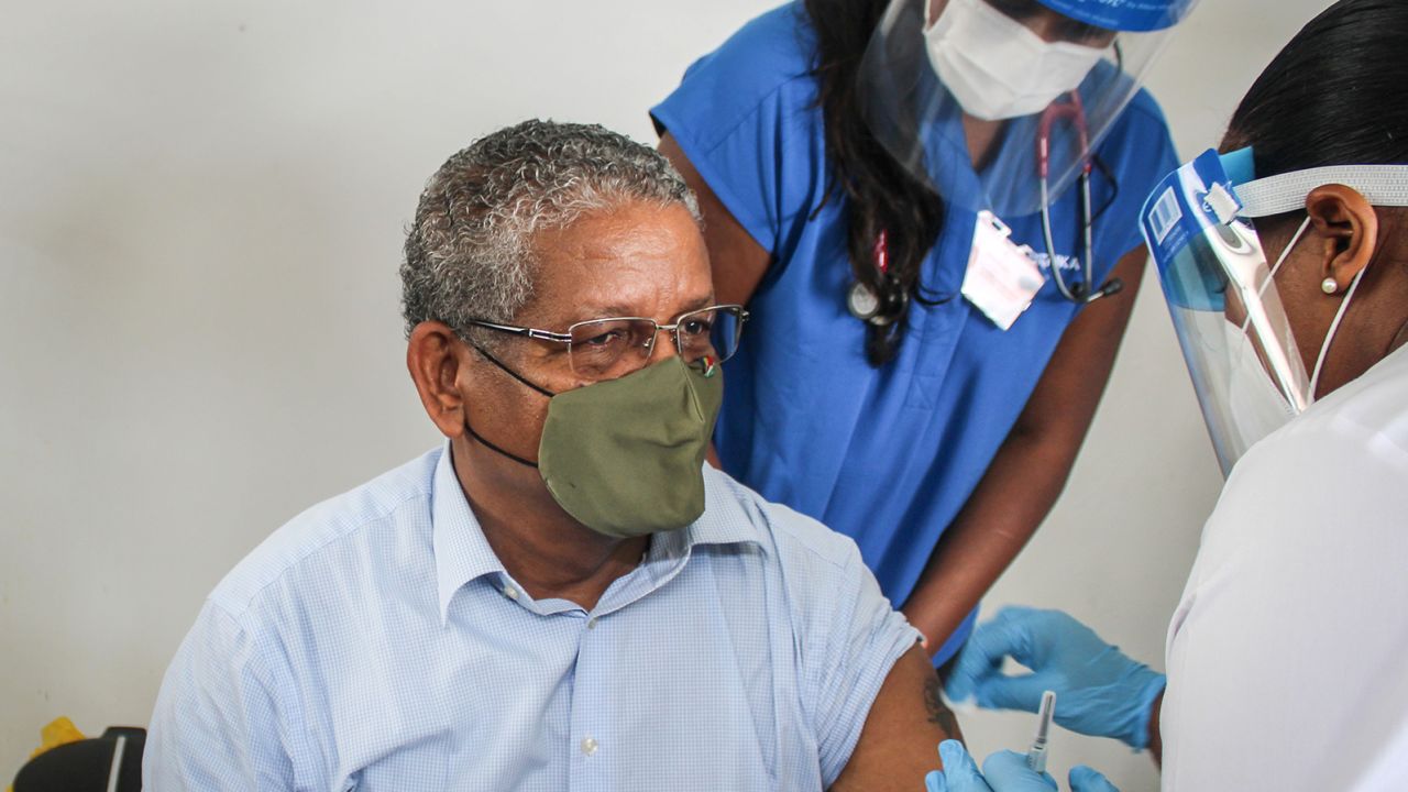 President of Seychelles Wavel Ramkalawan receives the first dose of the Covid-19 vaccine at the Seychelles Hospital in Victoria on January 10, 2021.