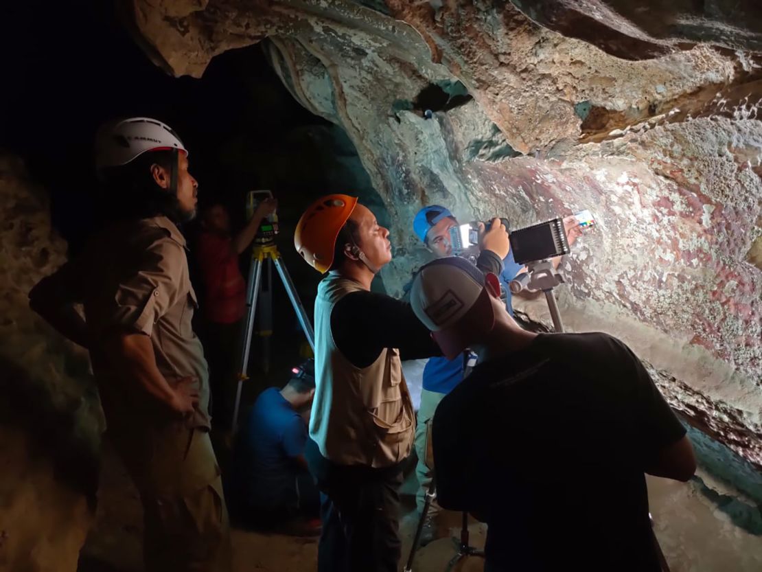 Staff from the BPCB conservation agency monitor the rock art in Maros-Pangkep 