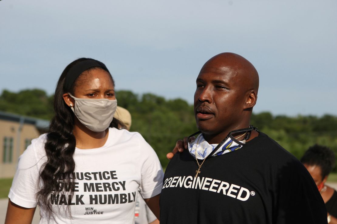 Jonathan Irons (right) alongside WNBA star Maya Moore, after being released from the Jefferson City Correctional Center.