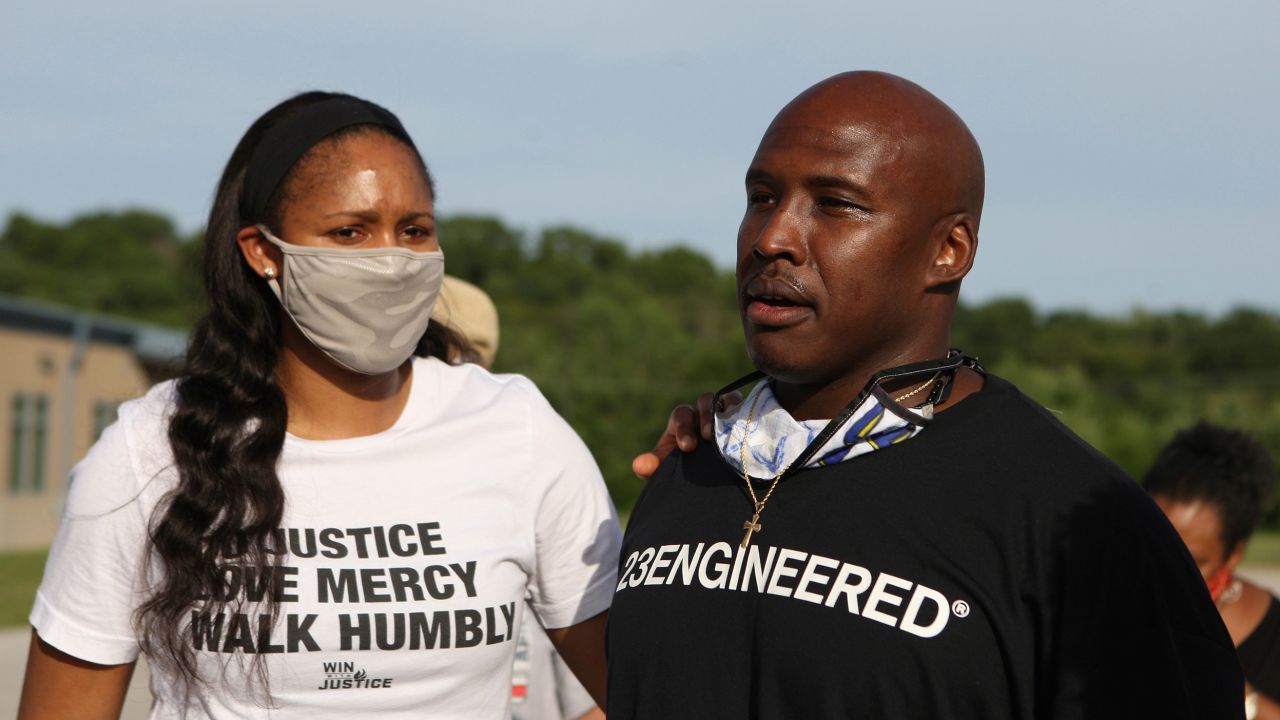Jonathan Irons (right) alongside WNBA star Maya Moore, after being released from the Jefferson City Correctional Center.