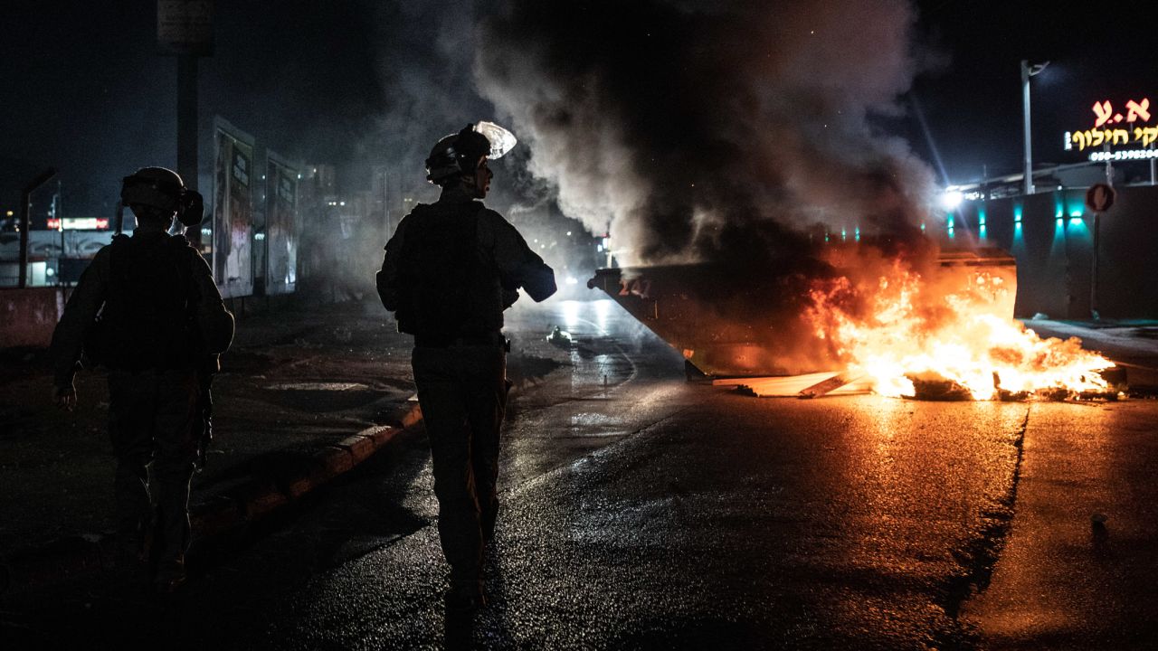 Israeli police patrol during clashes between Arab and Jewish citizens in Lod on Wednesday.