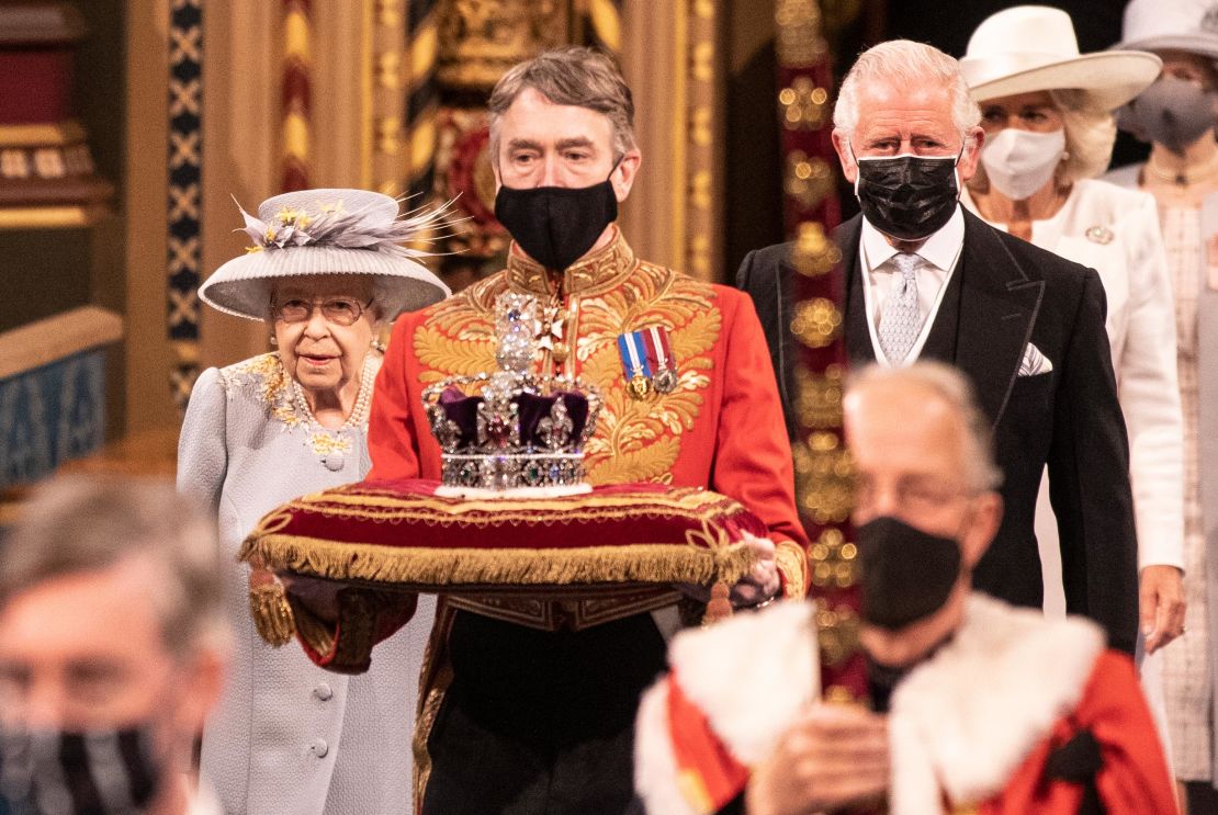 The Queen follows the Imperial State Crown along the royal gallery during the State Opening of Parliament at the House of Lords on Tuesday. 