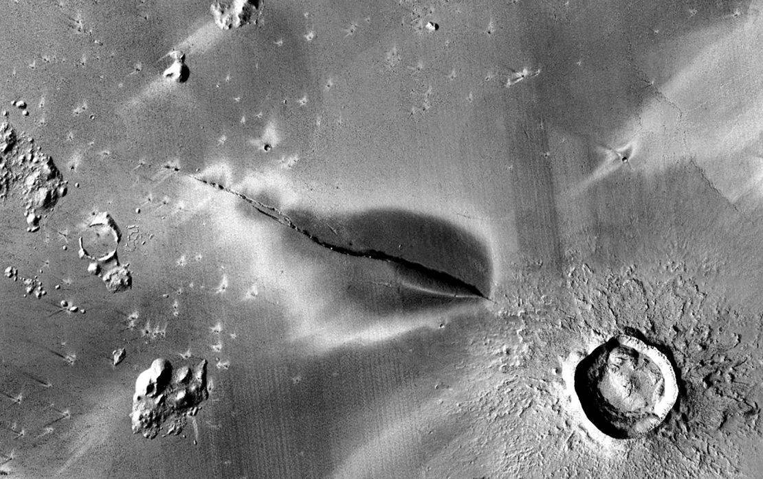This image shows a recent explosive volcanic deposit around a fissure of the Cerberus Fossae system on Mars.